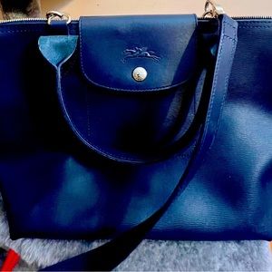 Longchamp bag. Coated canvas with leather trim.